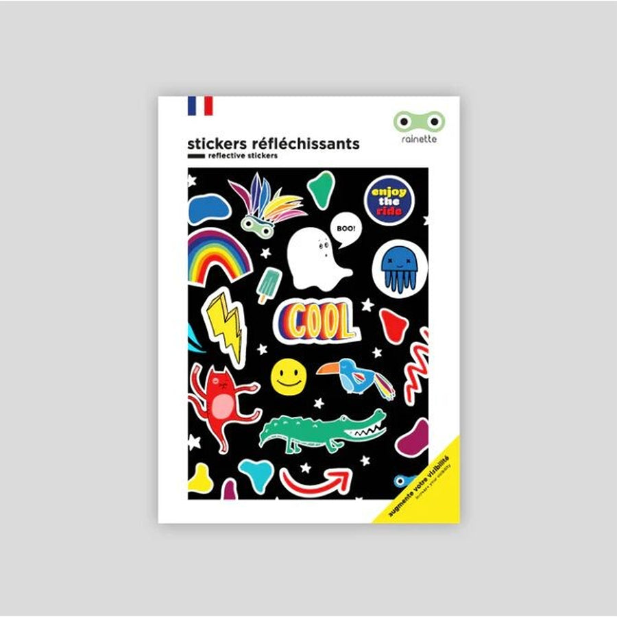 Stickers réfléchissants colorés pour enfants sur fond clair.