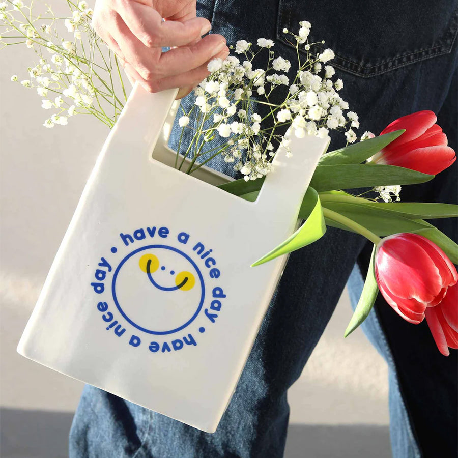 Vase en forme de sac de shopping avec motif smiley
