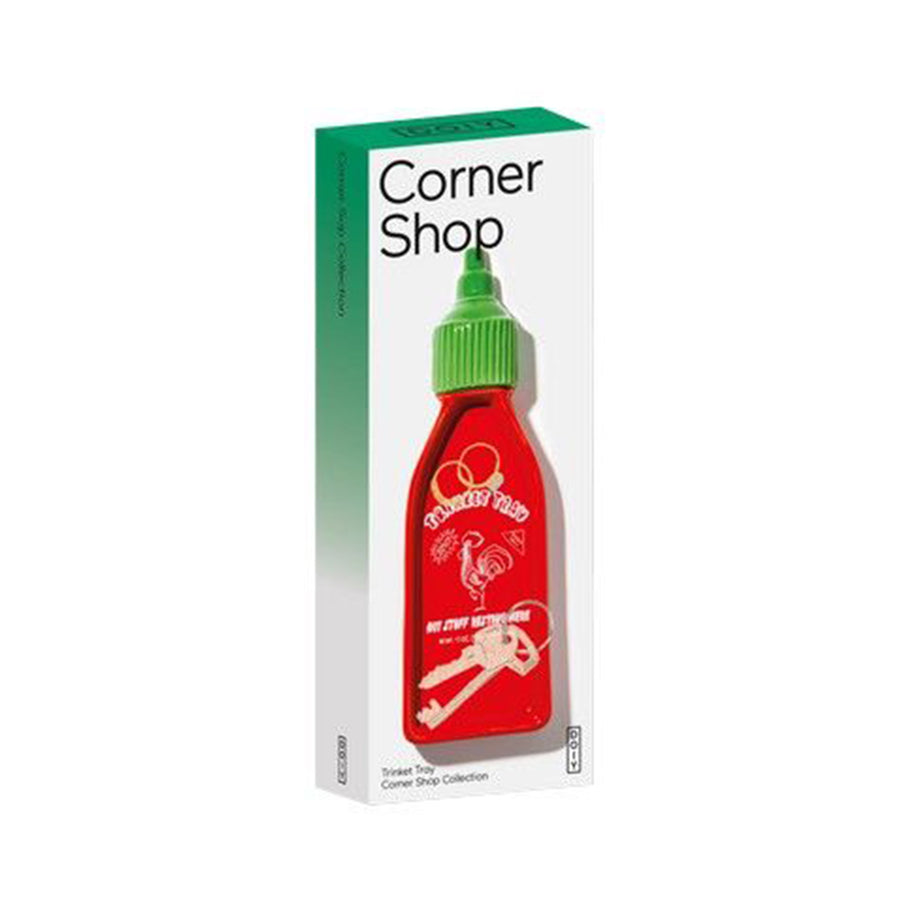 Vide-poche en forme de bouteille Sriracha avec détails colorés.