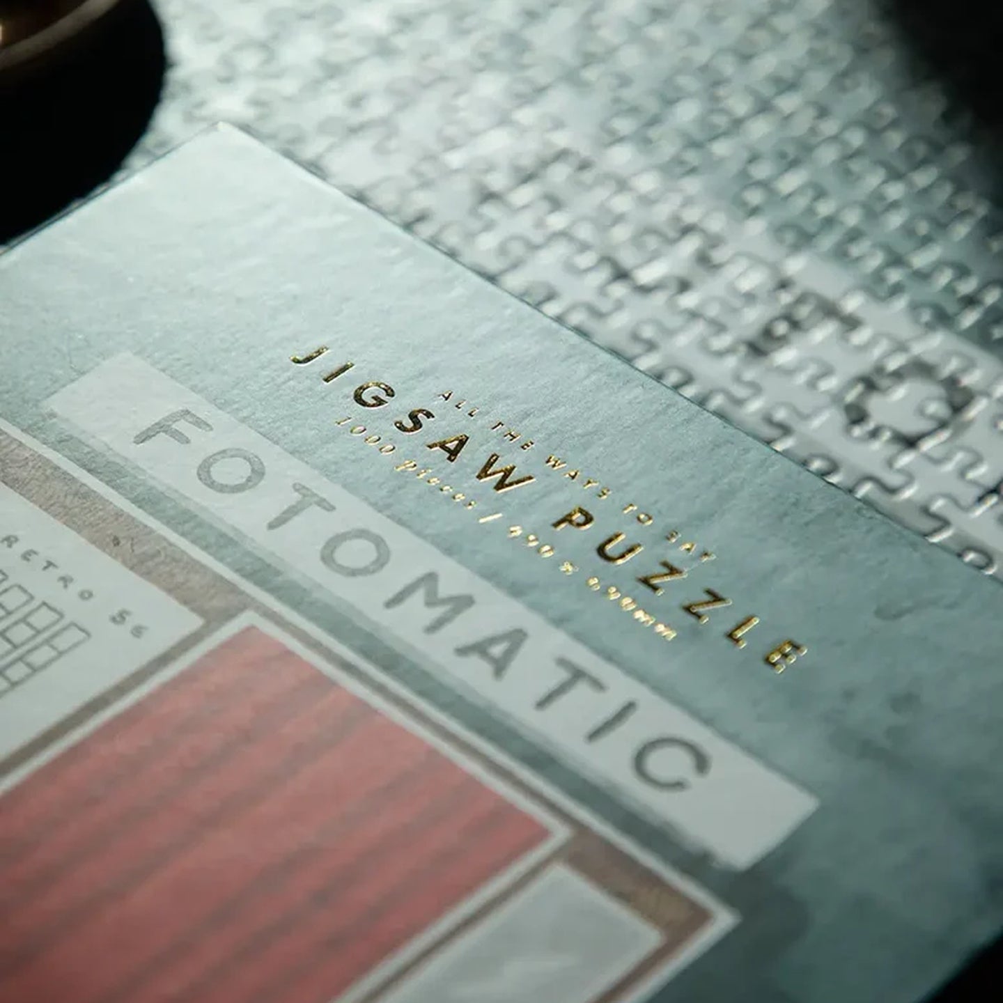 Puzzle Fotomatic avec emballage doré et motifs rétro