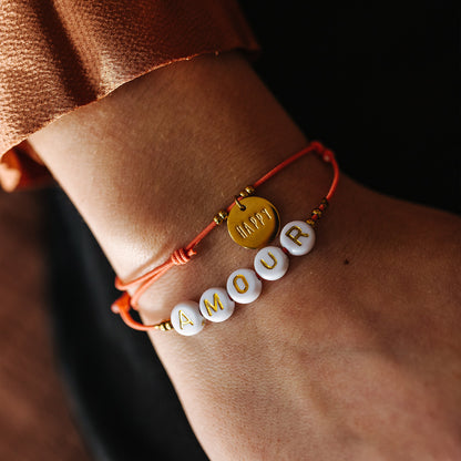 Deux bracelets Amour & Happy