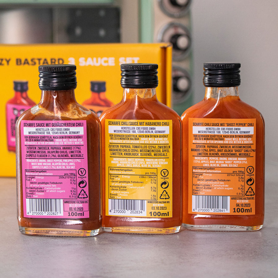 Pack de trois sauces épicées avec étiquettes colorées
