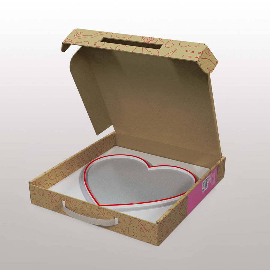 Néon en forme de cœur rouge éclatant sur fond neutre.