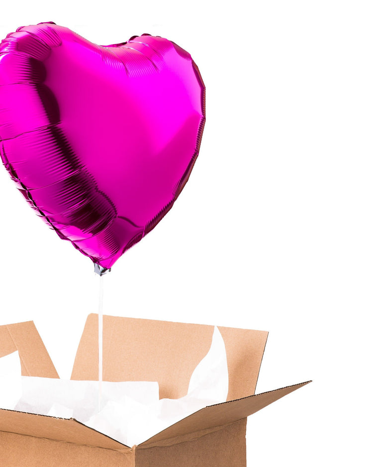Ballon coeur rose magenta, idéal pour offrir en cadeau d'amour ou d'amitié.