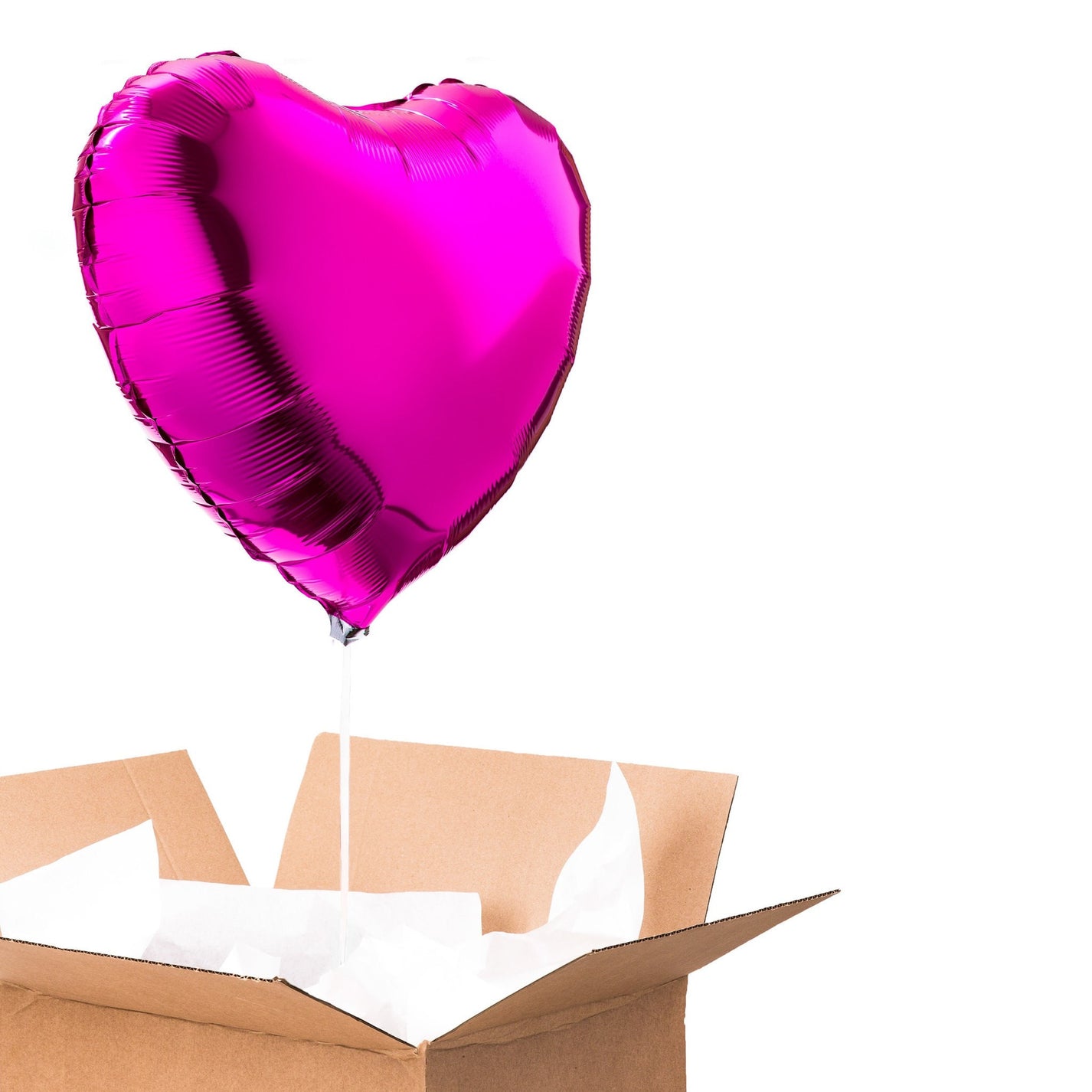 Ballon coeur rose magenta, idéal pour offrir en cadeau d'amour ou d'amitié.