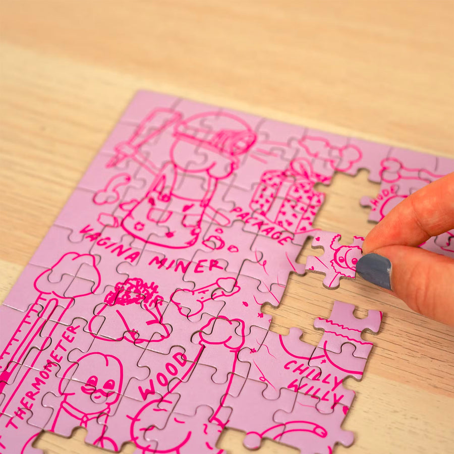 Puzzle humoristique avec illustrations de pénis en détail