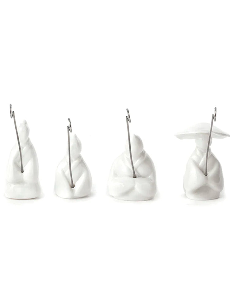 Porte-sachets de thé en forme de pêcheurs, vue de face.